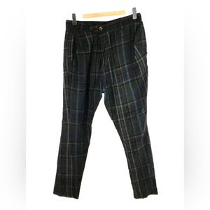 VIVIENNE WESTWOOD rare Tartan design “drunken” wool trousers with button fly